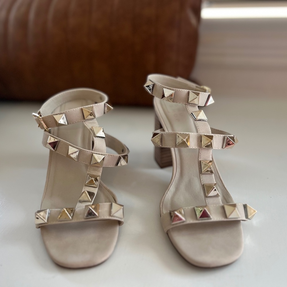 Gently worn spiked heeled sandals